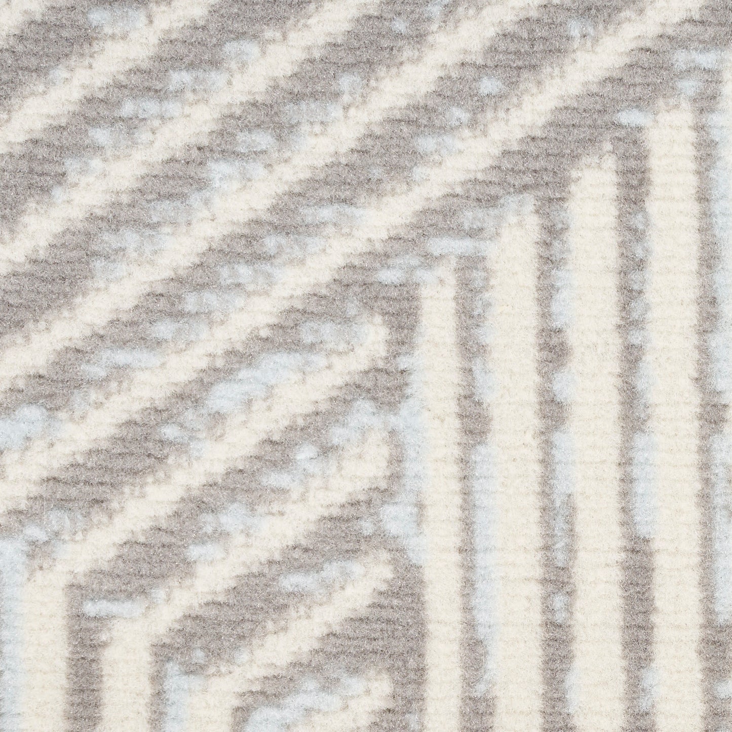 Gray and ivory geometric rug with chevron and stripe pattern in a textured woven weave.