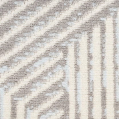 Gray and ivory geometric rug with chevron and stripe pattern in a textured woven weave.