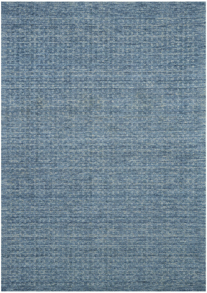 Blue woven area rug with subtle lighter and darker blue tones and a distressed texture; modern casual style.