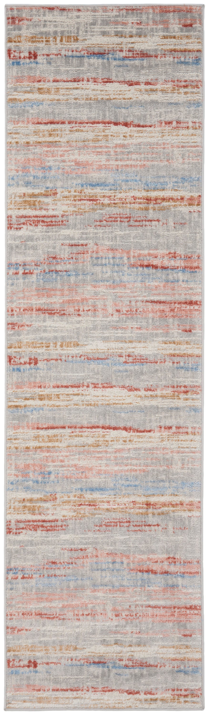 Long narrow area rug with abstract horizontal stripes in peach, blue and ivory; distressed woven texture.