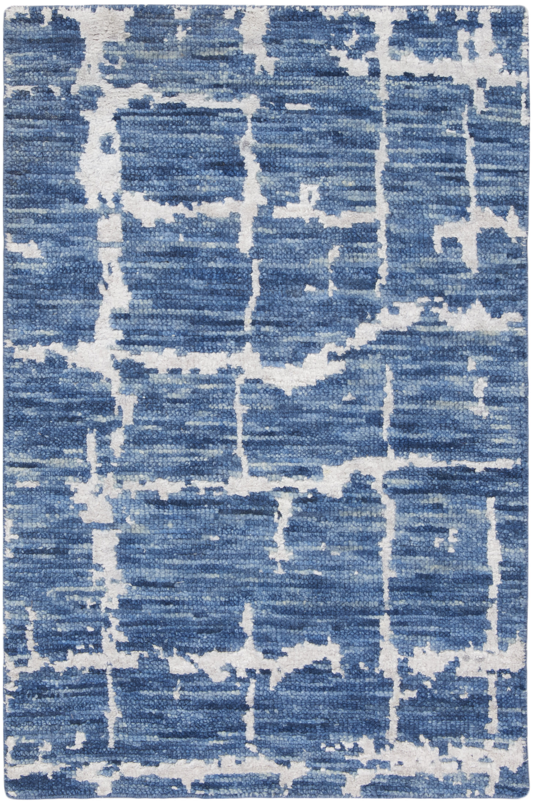 Rectangular blue area rug with white abstract grid pattern and distressed texture; modern, versatile for living rooms.
