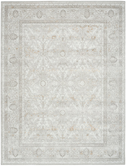 Soft beige-gray distressed oriental area rug with floral medallions and layered borders.