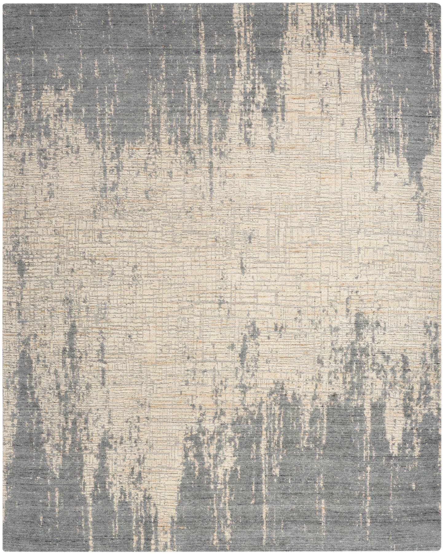 Abstract distressed area rug in grey and beige tones with a brushstroke pattern.