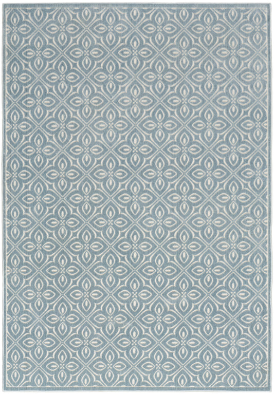 Blue-gray rug with a repeating white geometric diamond pattern and subtle border.