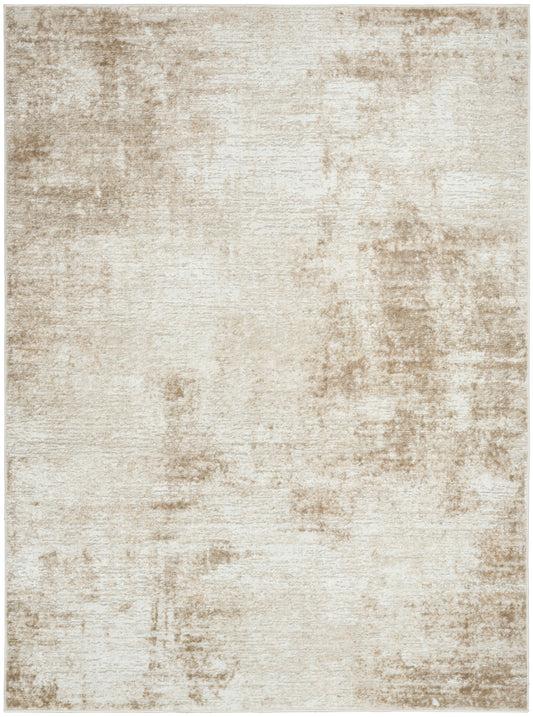 Beige and cream distressed area rug with a soft, mottled pattern for neutral living room decor.
