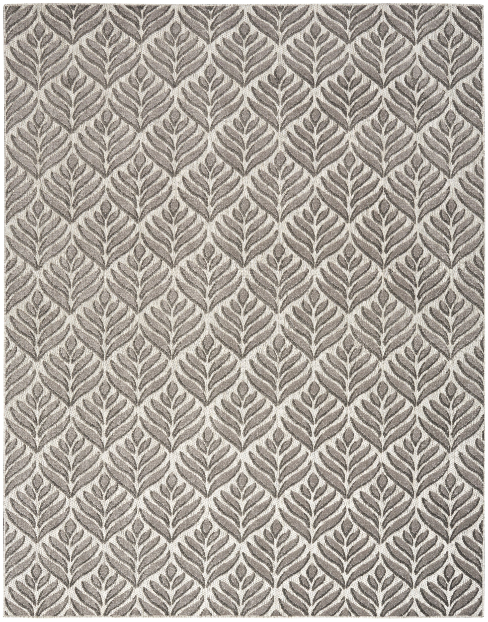 Gray area rug with taupe leaf motifs in a repeating tropical botanical pattern.