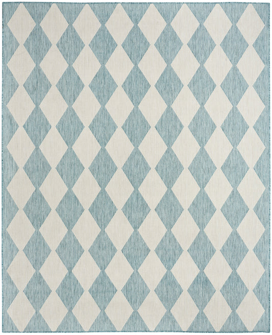 Blue textured rug with cream diamond argyle pattern on teal-blue weave.