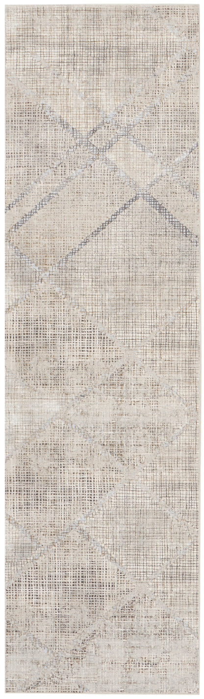 Rectangular beige runner rug with subtle gray diamond patchwork pattern.