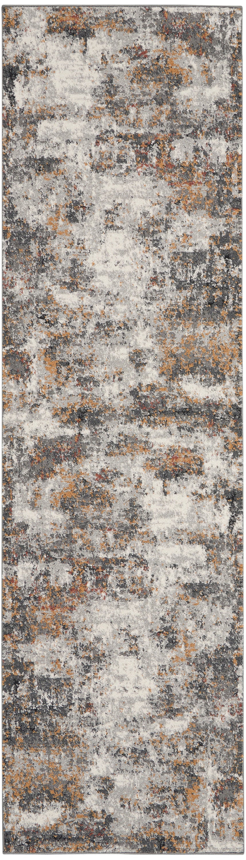 Abstract distressed runner rug in gray, ivory, and burnt orange tones with a plush mottled pattern.