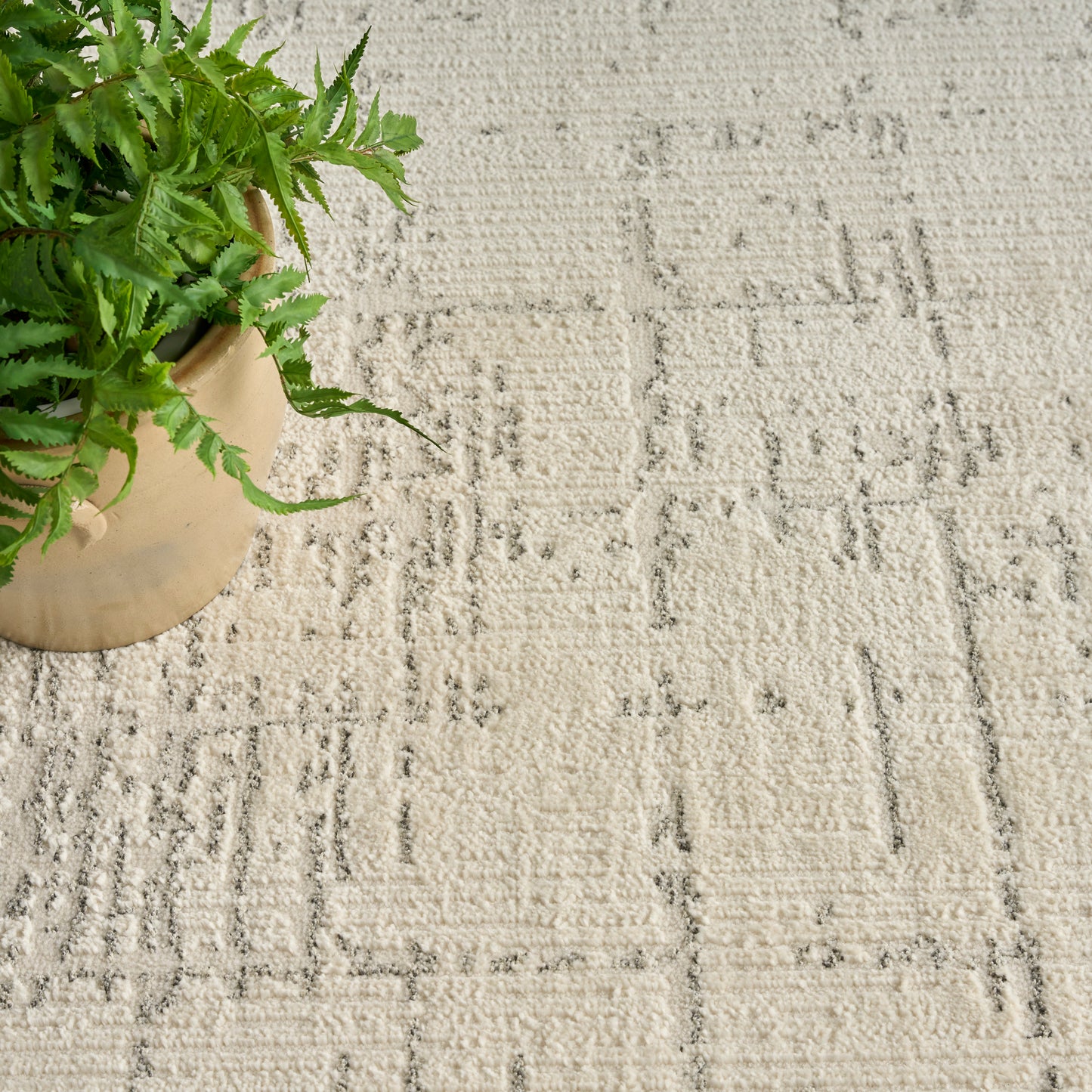 Beige patterned area rug.