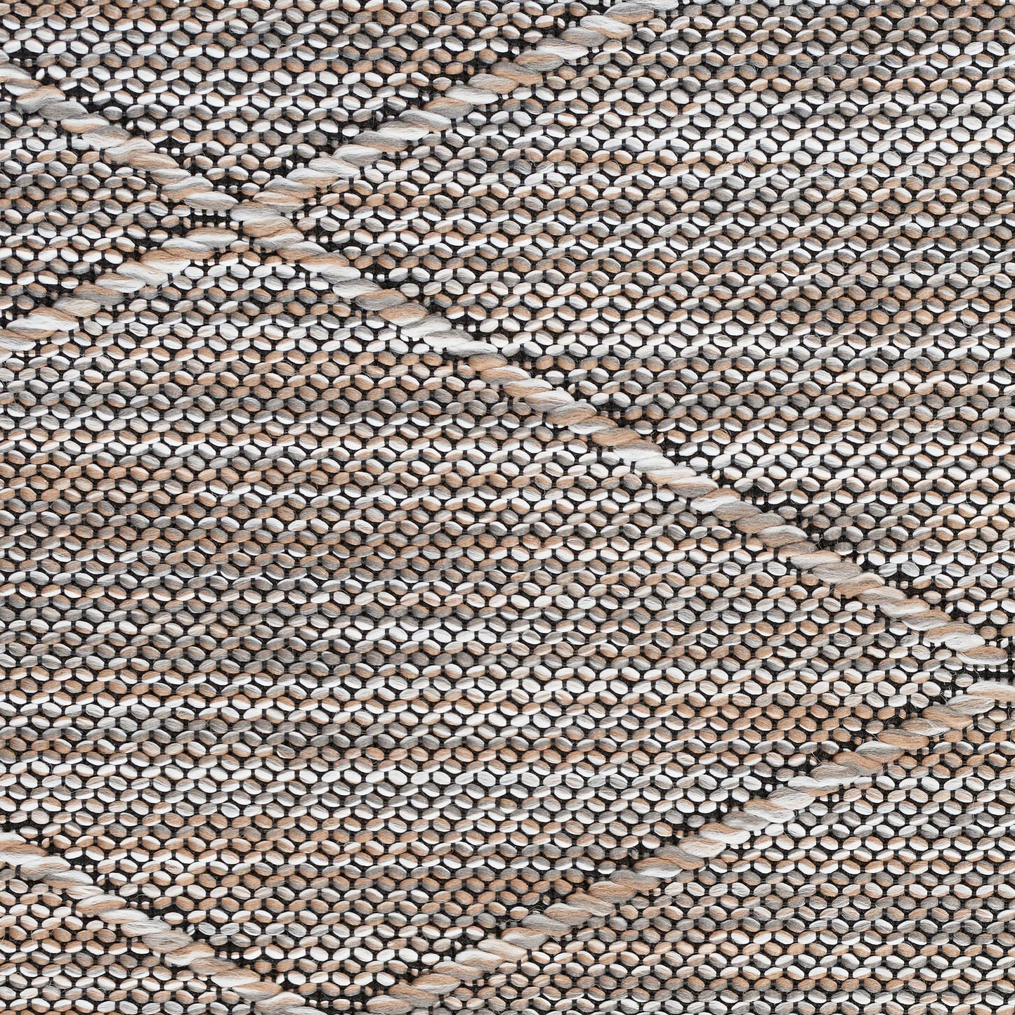 Close-up of a beige and gray woven rug with braided diagonal lines forming diamond shapes.