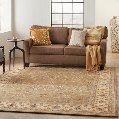 Beige oriental-patterned rug with a traditional motif; visible browns, mustard, and creams; 8' x 10' rug.