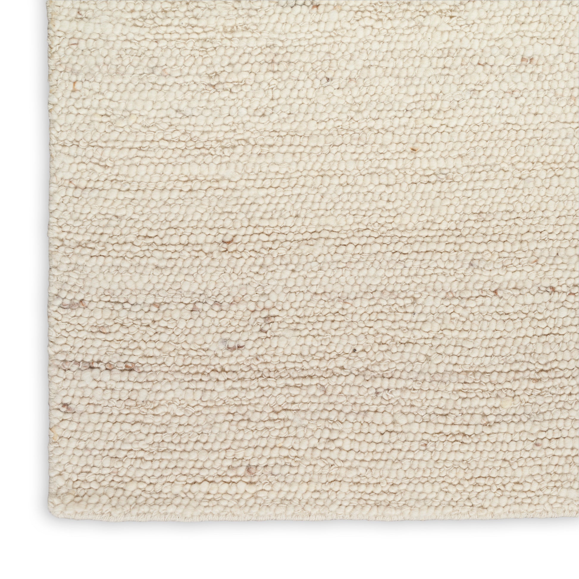 Cream boucle rug close-up: ivory woven loop pile with subtle specks for a cozy decorative accent.