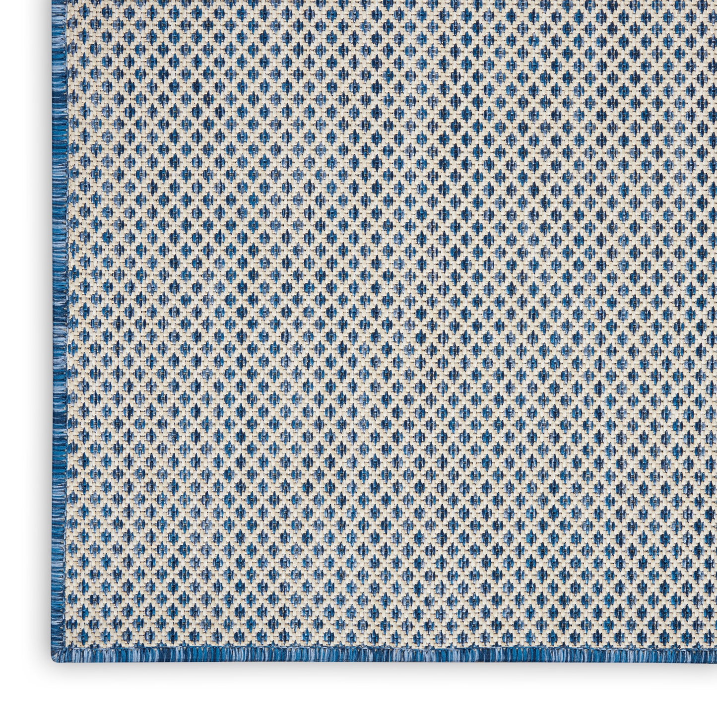 Grey gradient rug runner with blue and white geometric woven border along bottom edge.