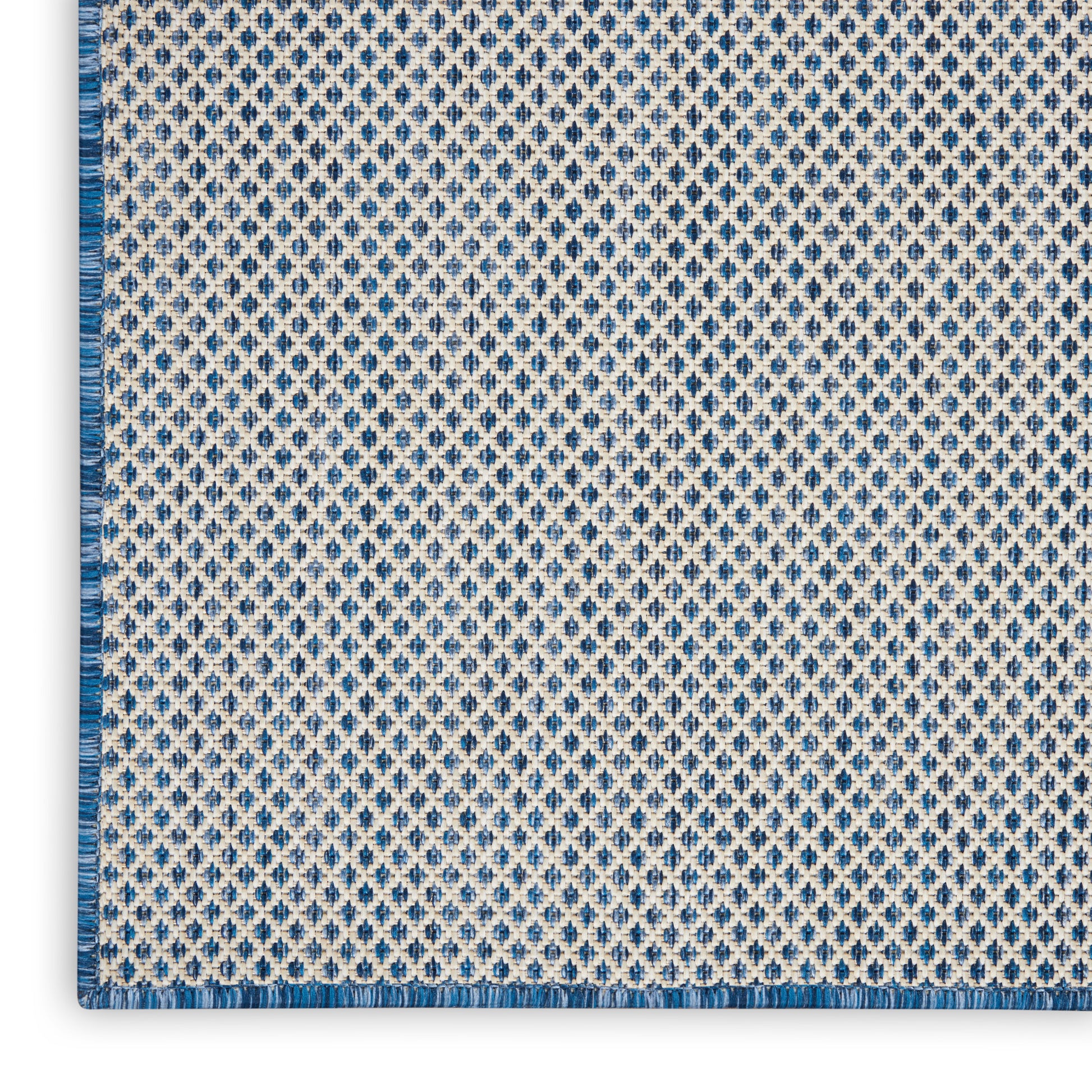 Grey gradient rug runner with blue and white geometric woven border along bottom edge.