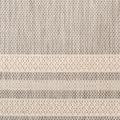 Beige woven fabric with cream horizontal bands and textured lattice patterns; versatile rug or throw.