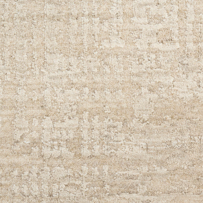 Beige textured area rug with soft cream-tan patches in an abstract, woven pattern.