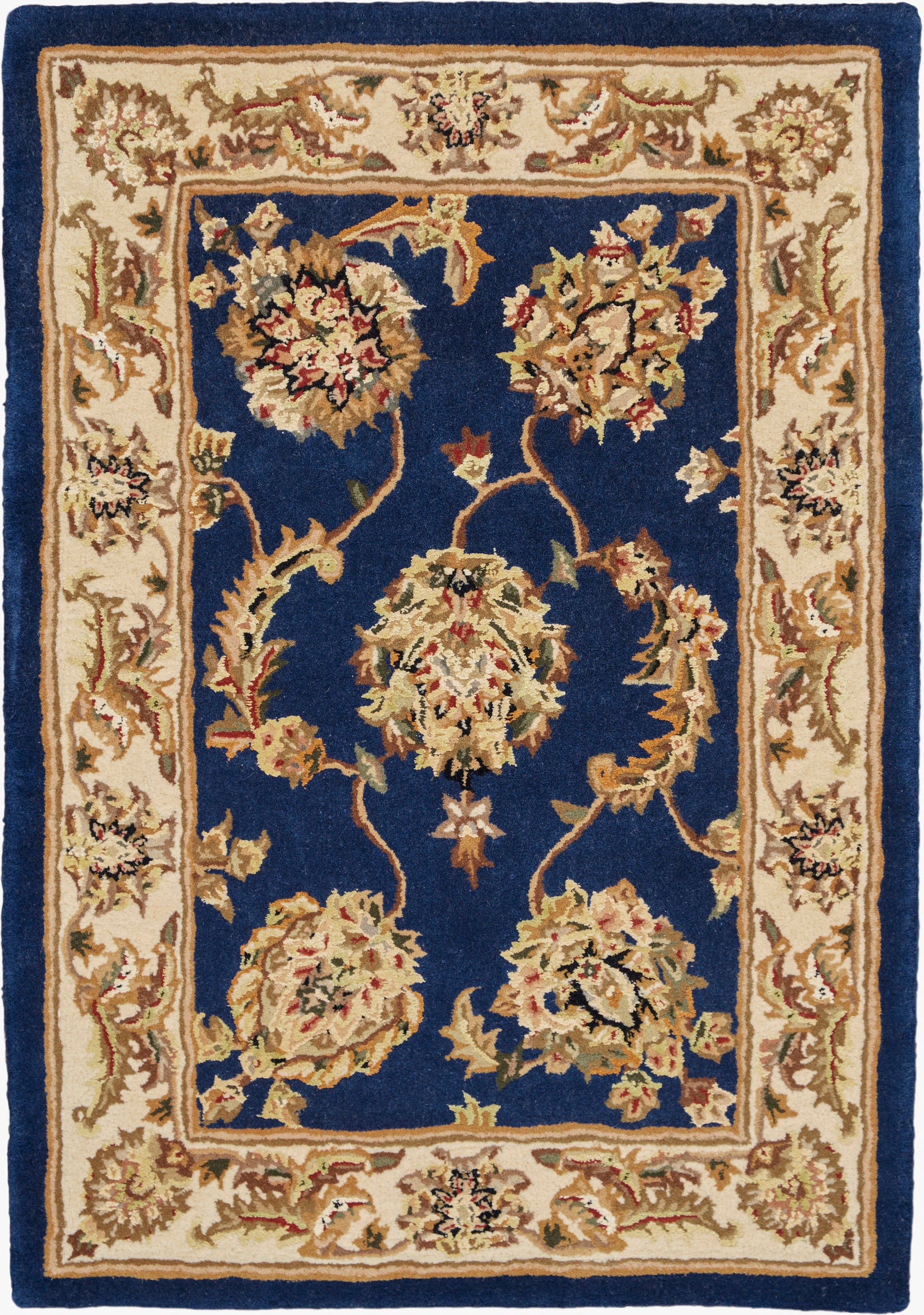 Traditional Persian-style area rug with deep navy field, cream floral border & medallion clusters; woven pile.
