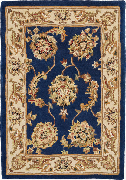 Traditional Persian-style area rug with deep navy field, cream floral border & medallion clusters; woven pile.