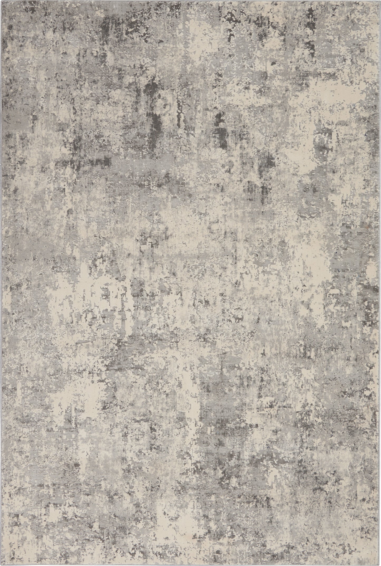 Rustic beige and gray area rug with a distressed, mottled abstract pattern (6' x 9').