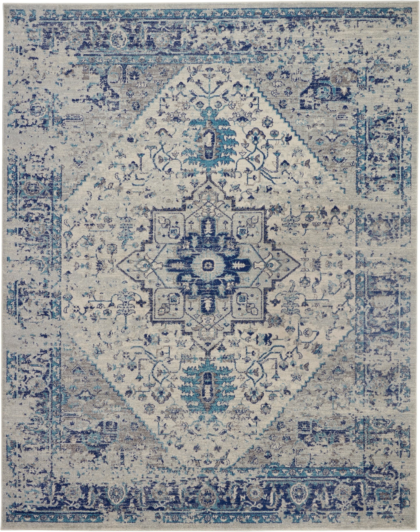 Blue & ivory distressed oriental rug with central geometric medallion, floral motifs & ornate border.