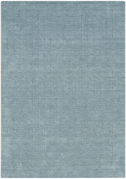 Rectangular blue-gray woven rug with subtle geometric chevron pattern; modern, versatile decor for living room.