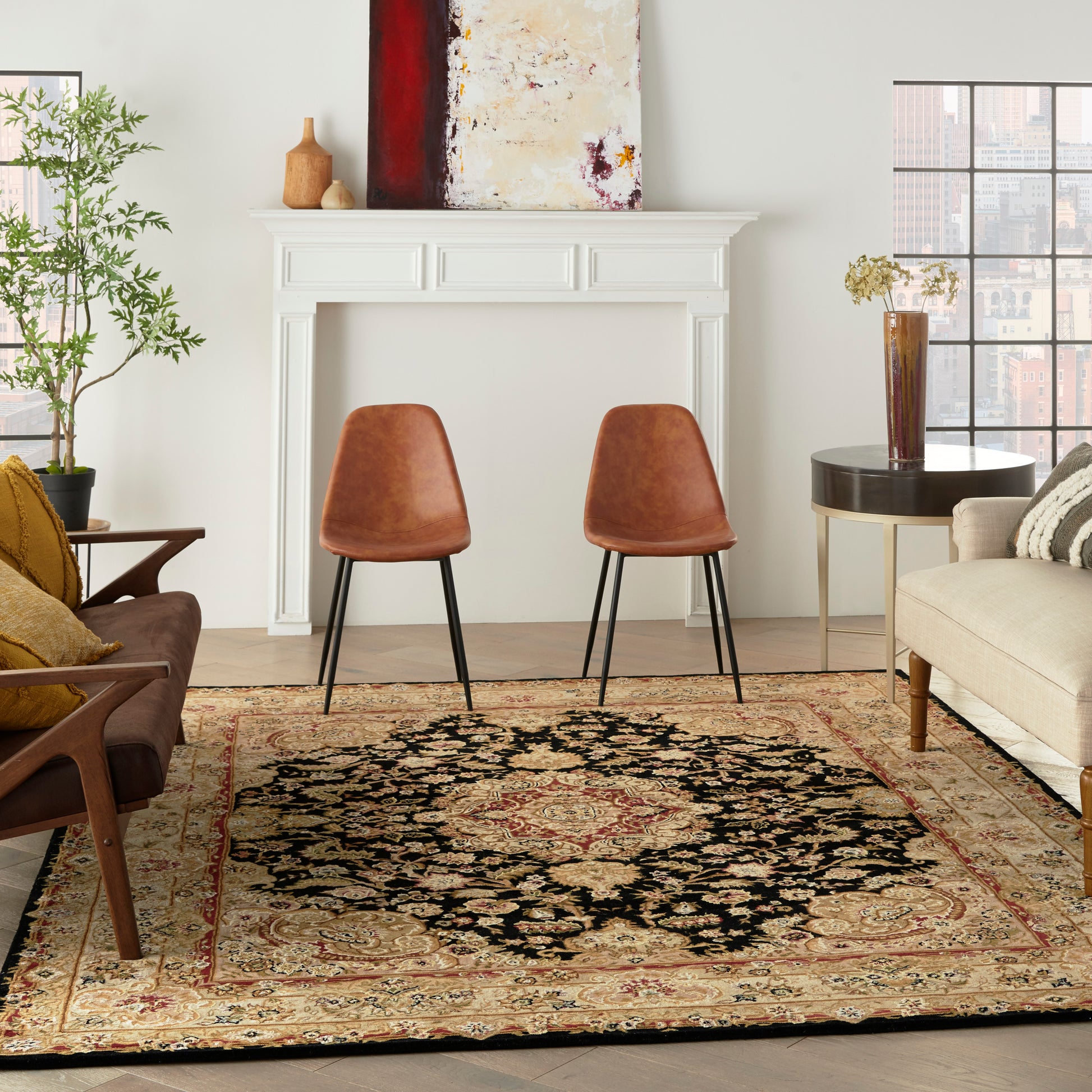 Cozy living room with white fireplace, mid-century chairs, ornate area rug, beige sofa, plant and abstract art.