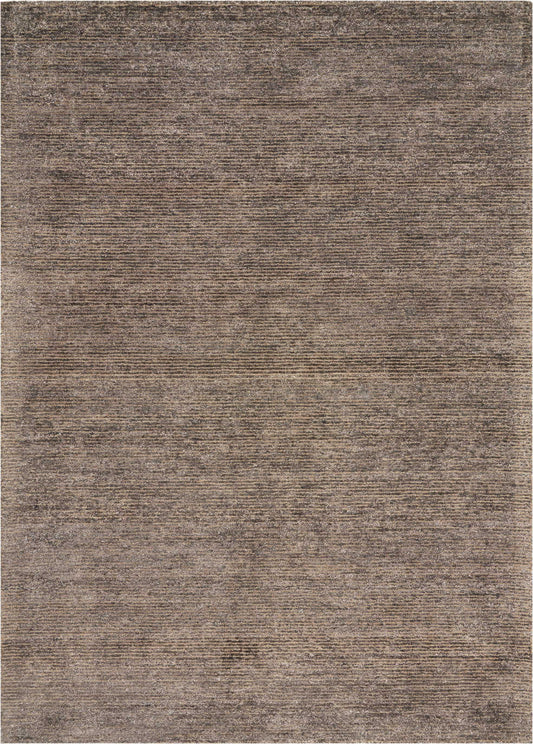 Brown taupe textured rug with muted variegated weave, rectangular, cozy living-room accessory.