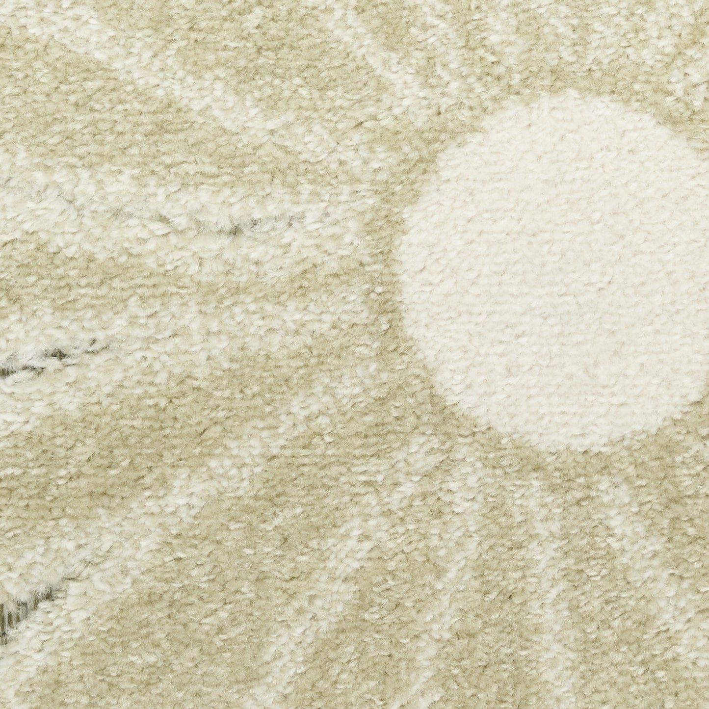 Beige outdoor shag rug with a large cream circle motif, plush texture, and a modern geometric look for outdoor spaces.