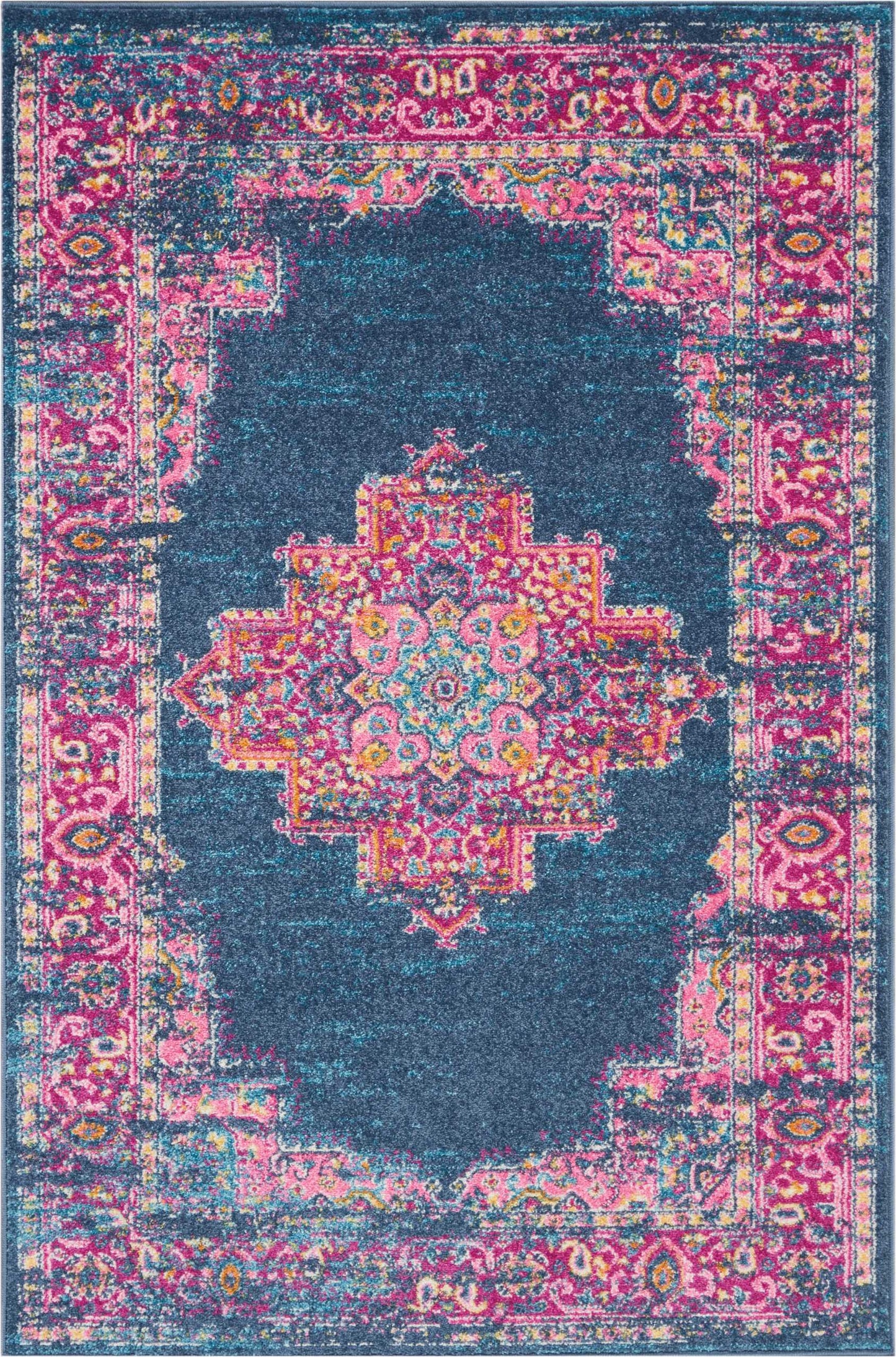 Bohemian-inspired rug with a navy field, vivid pink borders, turquoise accents, & a central ornate medallion; decorative floor accent.