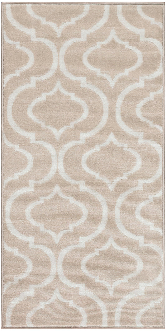 Beige rectangular rug with white arabesque trellis pattern and soft textured pile.