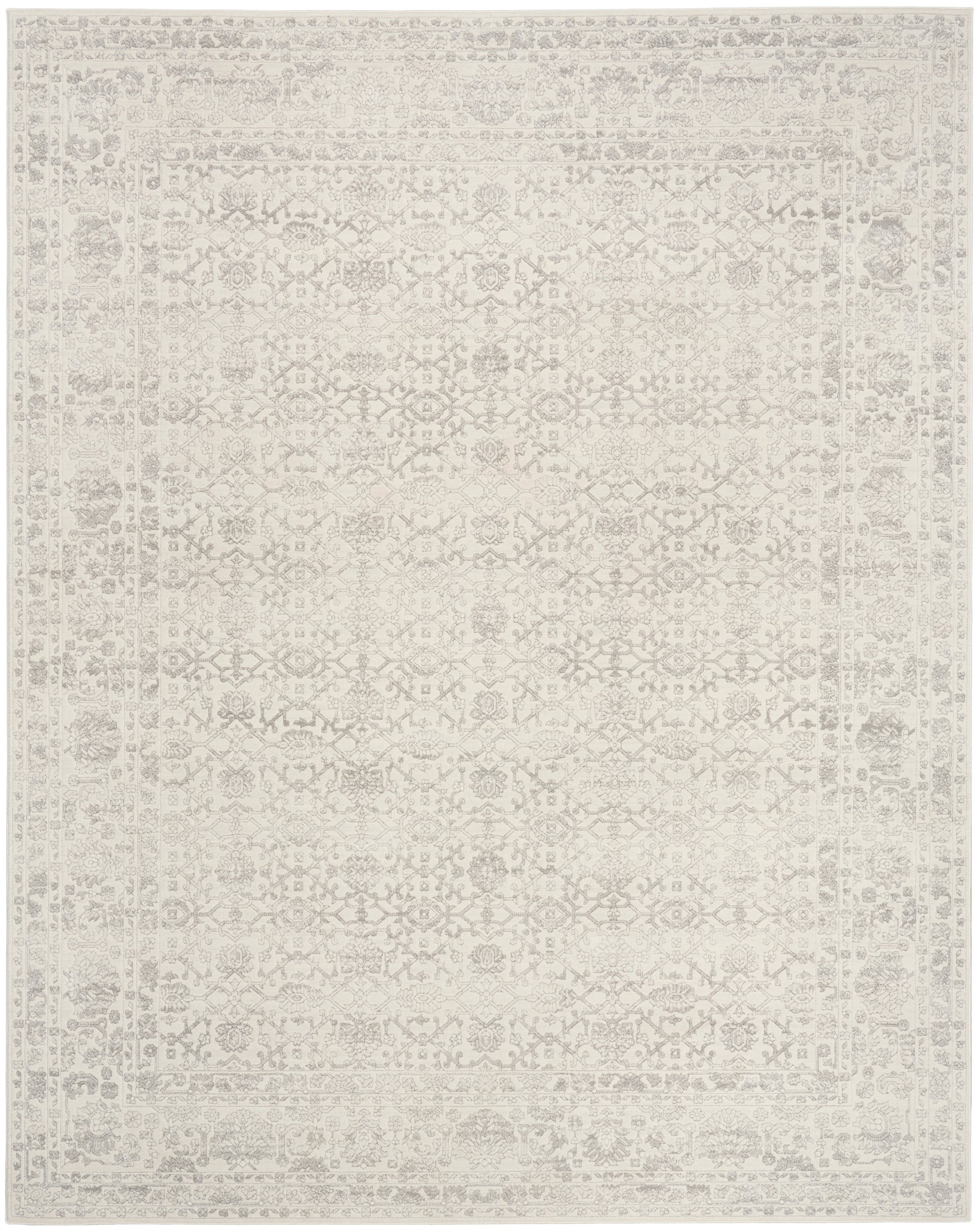 Cream-beige area rug with a subtle faded traditional oriental motif and soft, muted tones.