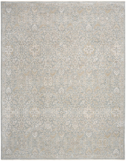 Neutral-toned vintage-style rug with Persian-inspired floral medallions in beige, ivory and gray.