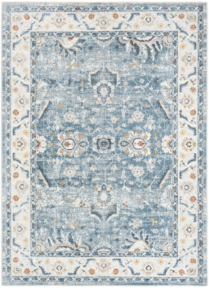 Rectangular blue distressed oriental area rug with ivory floral border and central medallion.