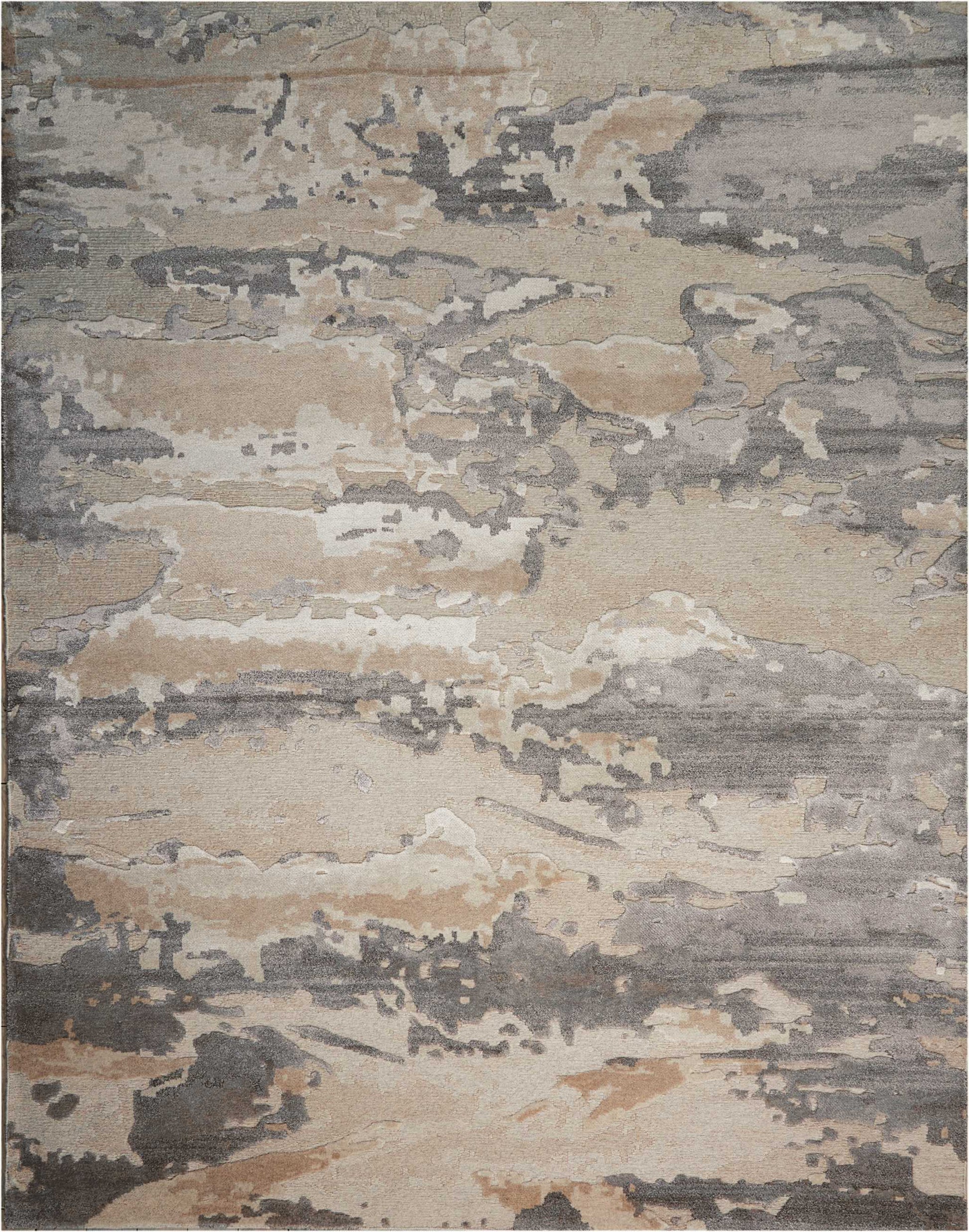Abstract area rug with beige, gray and taupe blotches; modern, painterly pattern and soft textured look.