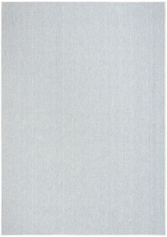 Light blue-gray woven rug with tiny grid texture and light border, rectangular.