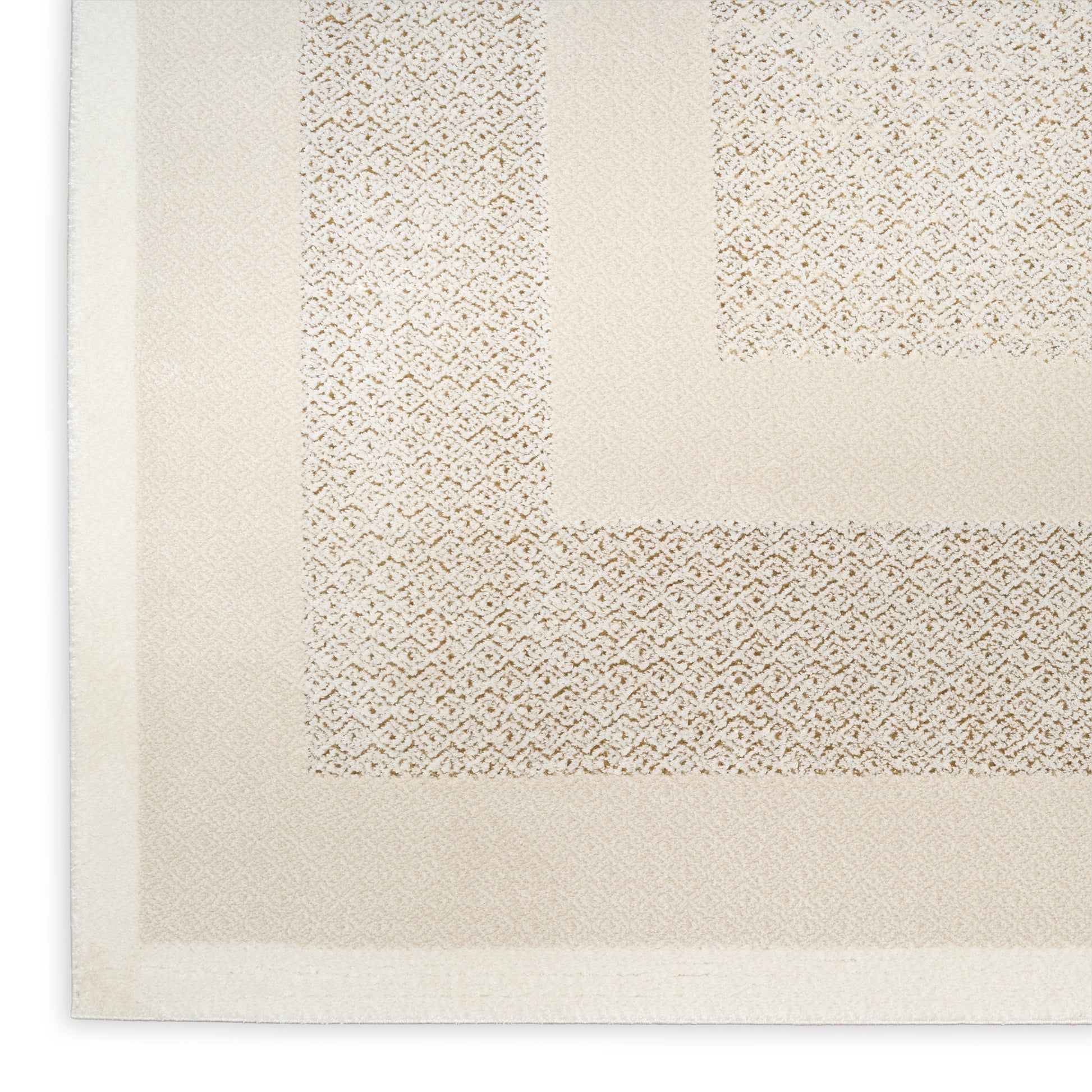 Beige woven area rug with a layered geometric border and subtle diamond texture; neutral, versatile home decor.