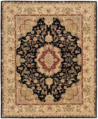 Persian-style rug with black central field, gold cream floral medallions, red border and elaborate beige border.