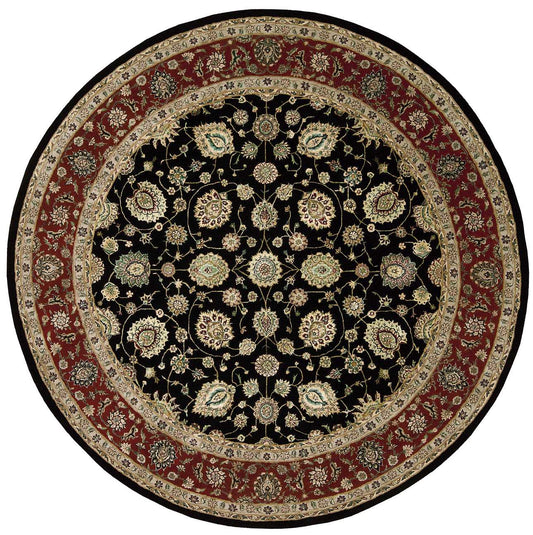 Round oriental rug: black center with gold floral motifs, cream border, red outer border; traditional Persian style.