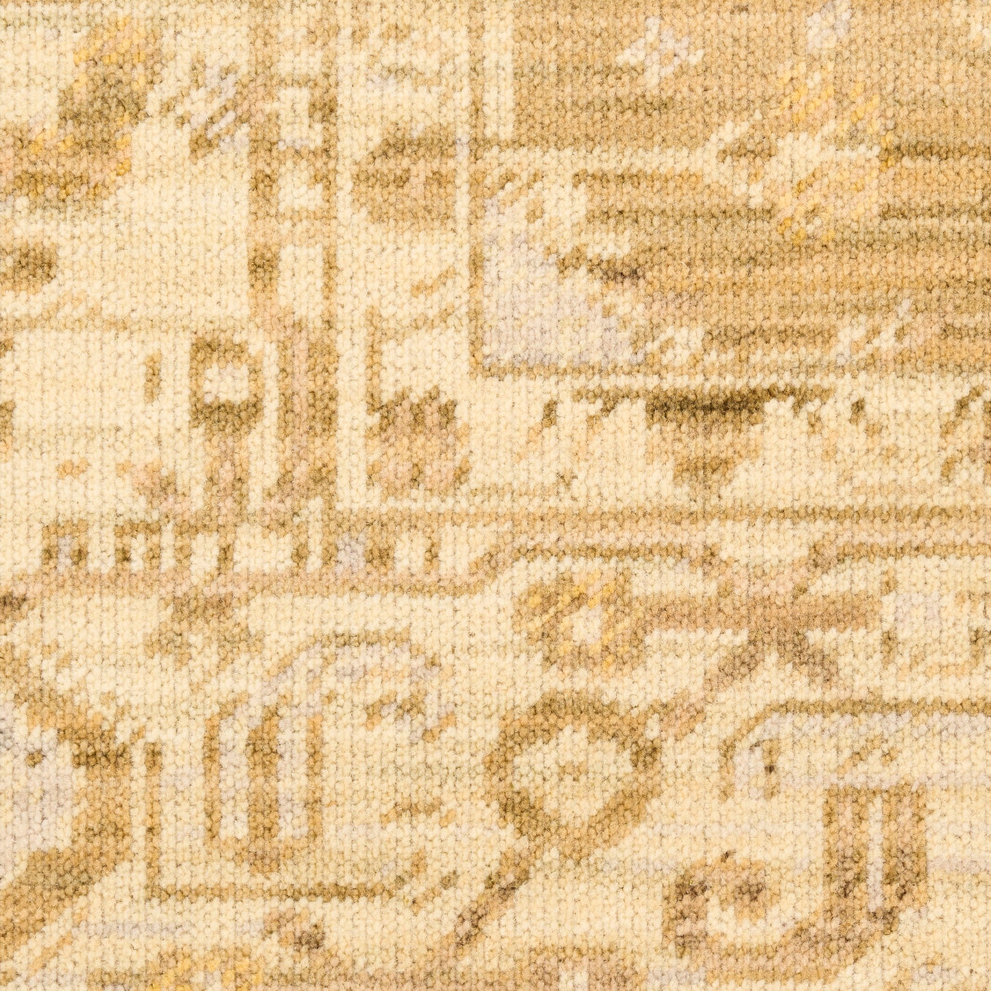 Beige woven rug with intricate tan floral-geometric patterns in a vintage oriental style.