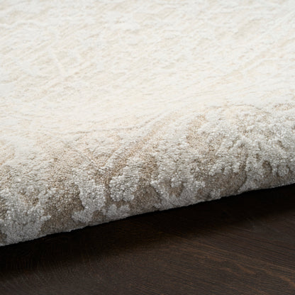 Cream and beige textured high-pile rug with a folded edge on dark wood floor.
