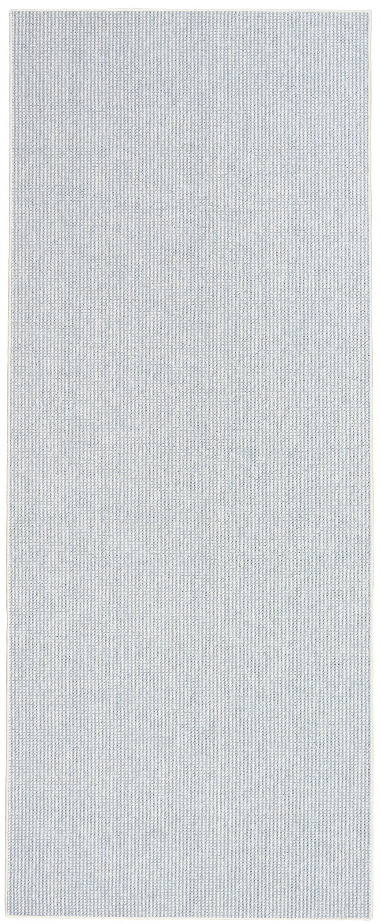 Light blue woven rug runner with a subtle white dot grid pattern; rectangular, farmhouse-style indoor rug, 8' long.