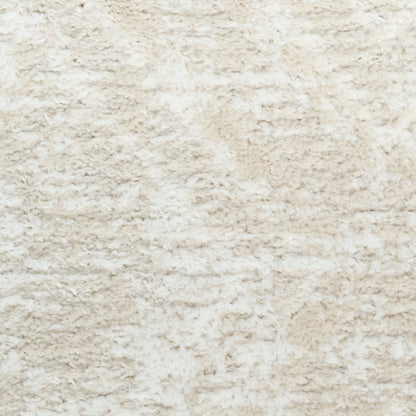 Cream beige shag rug with fluffy high-pile fibers, soft and cozy texture.