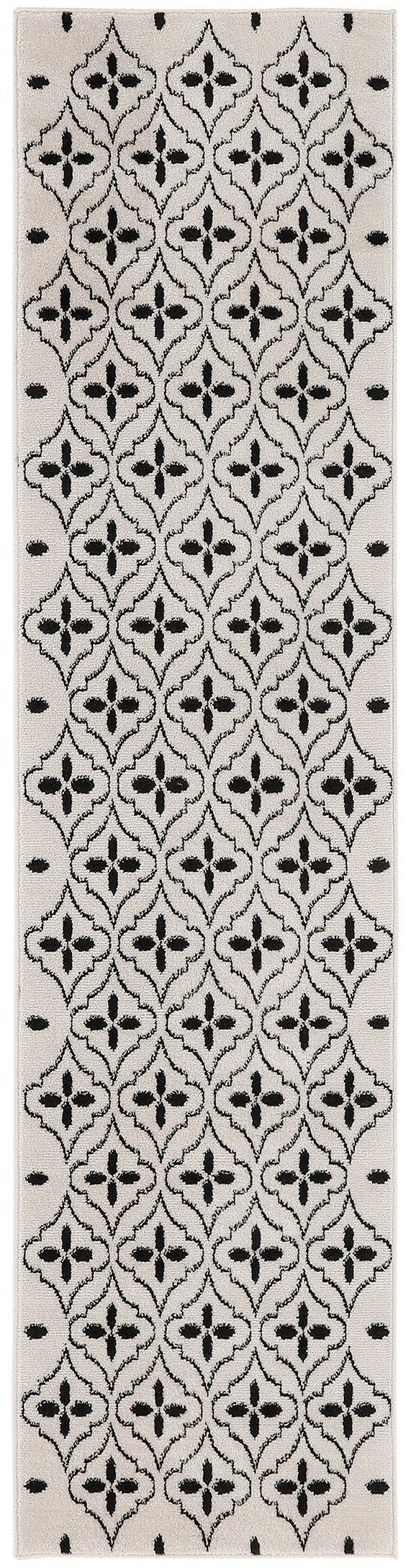Beige runner rug with black lattice-quatrefoil motif and small border dots.