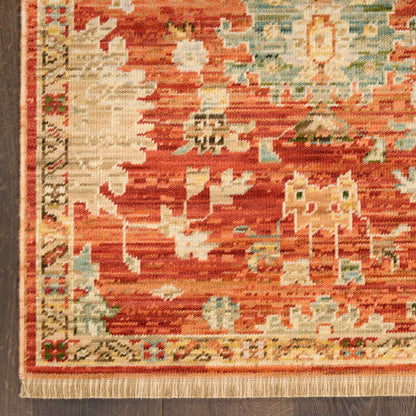 Red and ivory geometric oriental rug with blue and teal accents and fringe along the bottom edge.