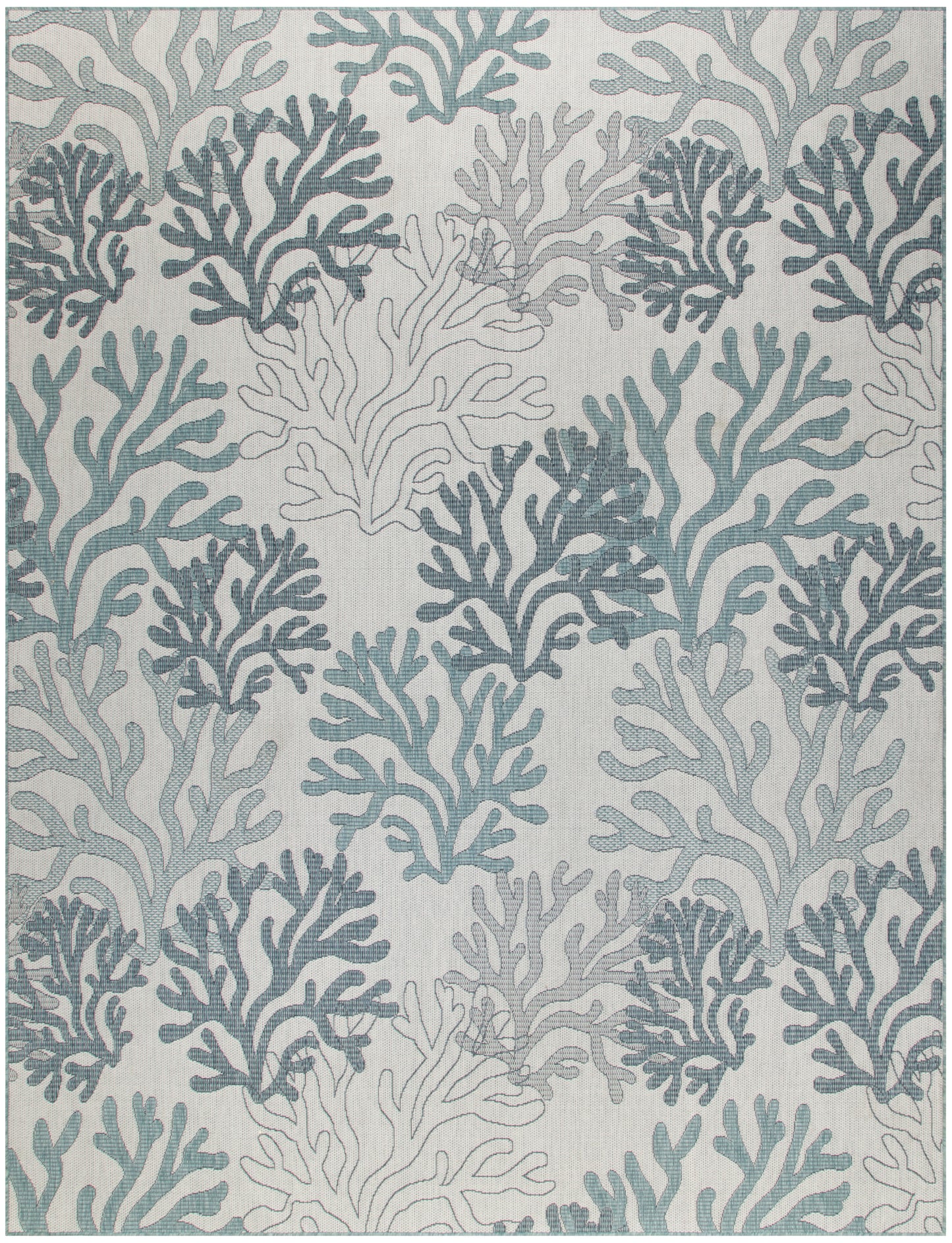 Patterned rug with sea coral silhouettes in teal and blue-gray on a pale background.