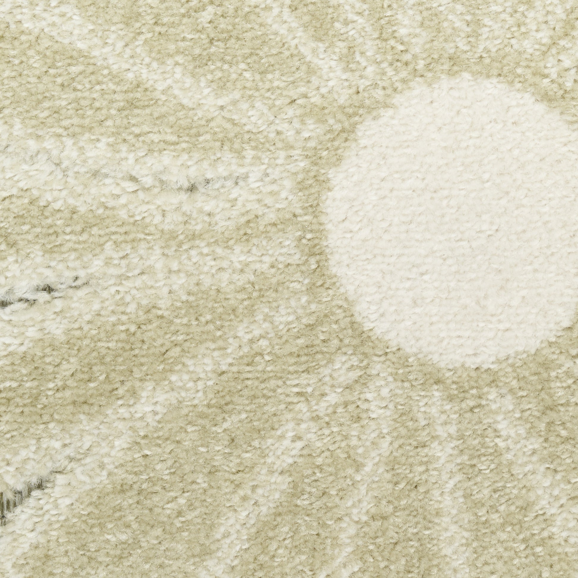 Cream outdoor rug with a large white circular patch; plush pile, modern abstract floor decor.