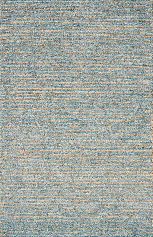 Rectangular flat-weave rug in blue and beige tones with subtle distressed texture, contemporary living room accent.