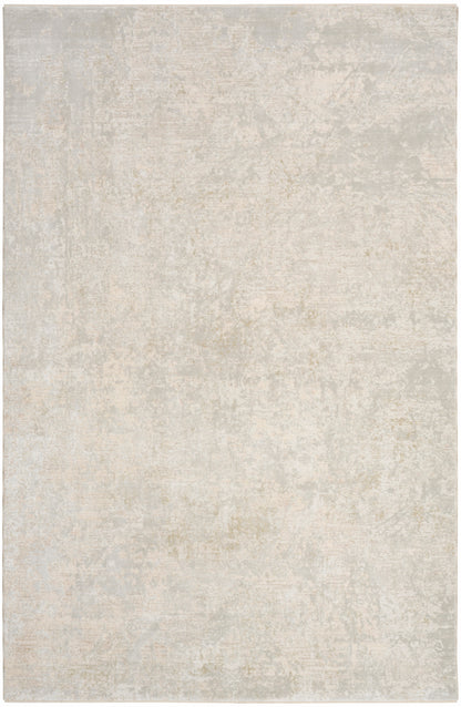 Neutral beige rug with subtle mottled texture in ivory-cream tones; flat-weave style.