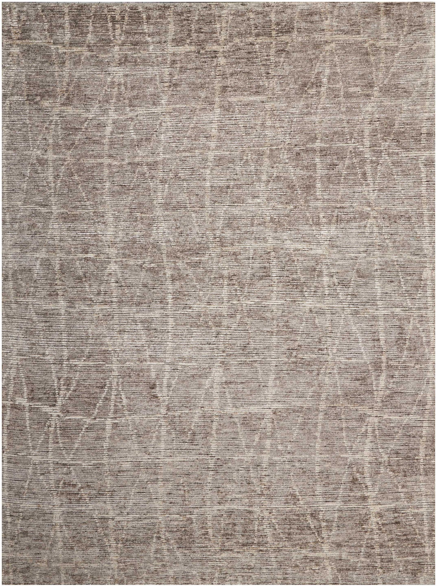 Taupe woven area rug with soft texture and subtle abstract geometric lattice pattern.